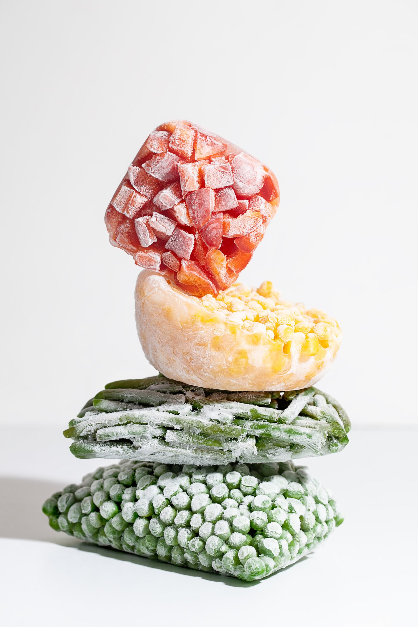 abstract modern composition frozen vegetables corn pepper green pea beans scaled